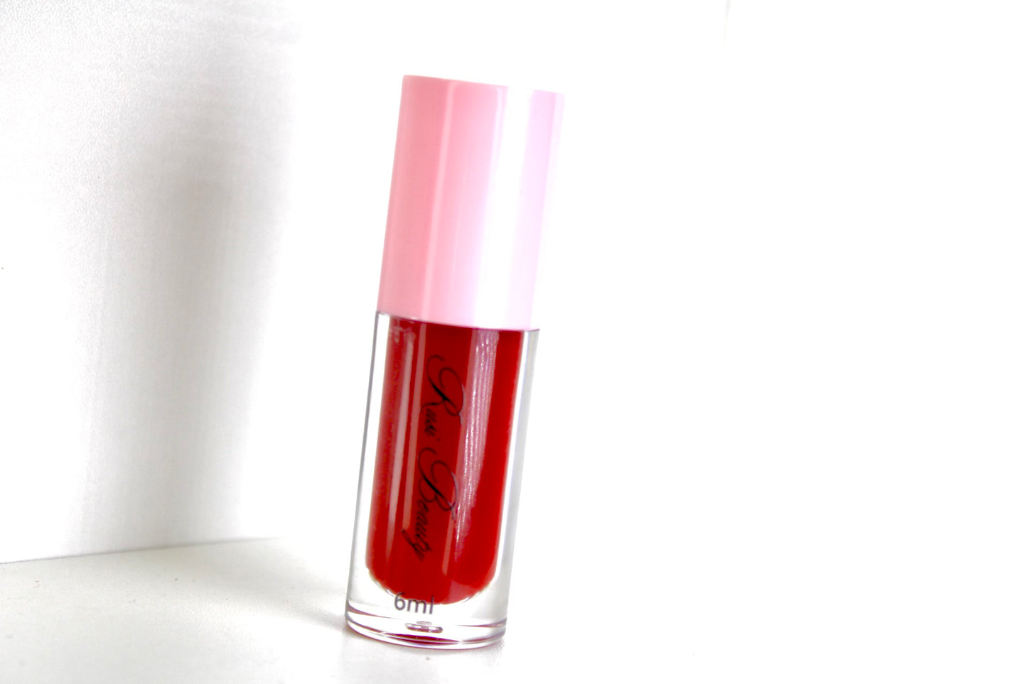 ed Sky Lip Gloss—a beautifully versatile shade with a hint of purple undertone. This sheer gloss glides on effortlessly, providing a subtle pop of color that enhances your natural beauty without overwhelming your lips. Perfectly designed to complement every skin tone, Red Sky is the go-to choice for a fresh, radiant look anytime, anywhere. Whether you’re aiming for a casual vibe or a touch of elegance, this lip gloss is your new must-have!



